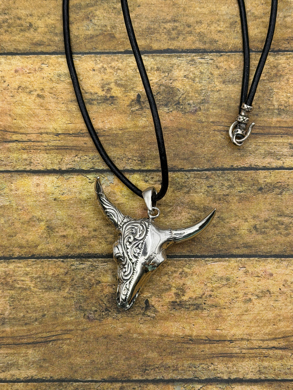 Brandy-Sterling Silver Engraved Cow Skull Pendant on Leather Rope