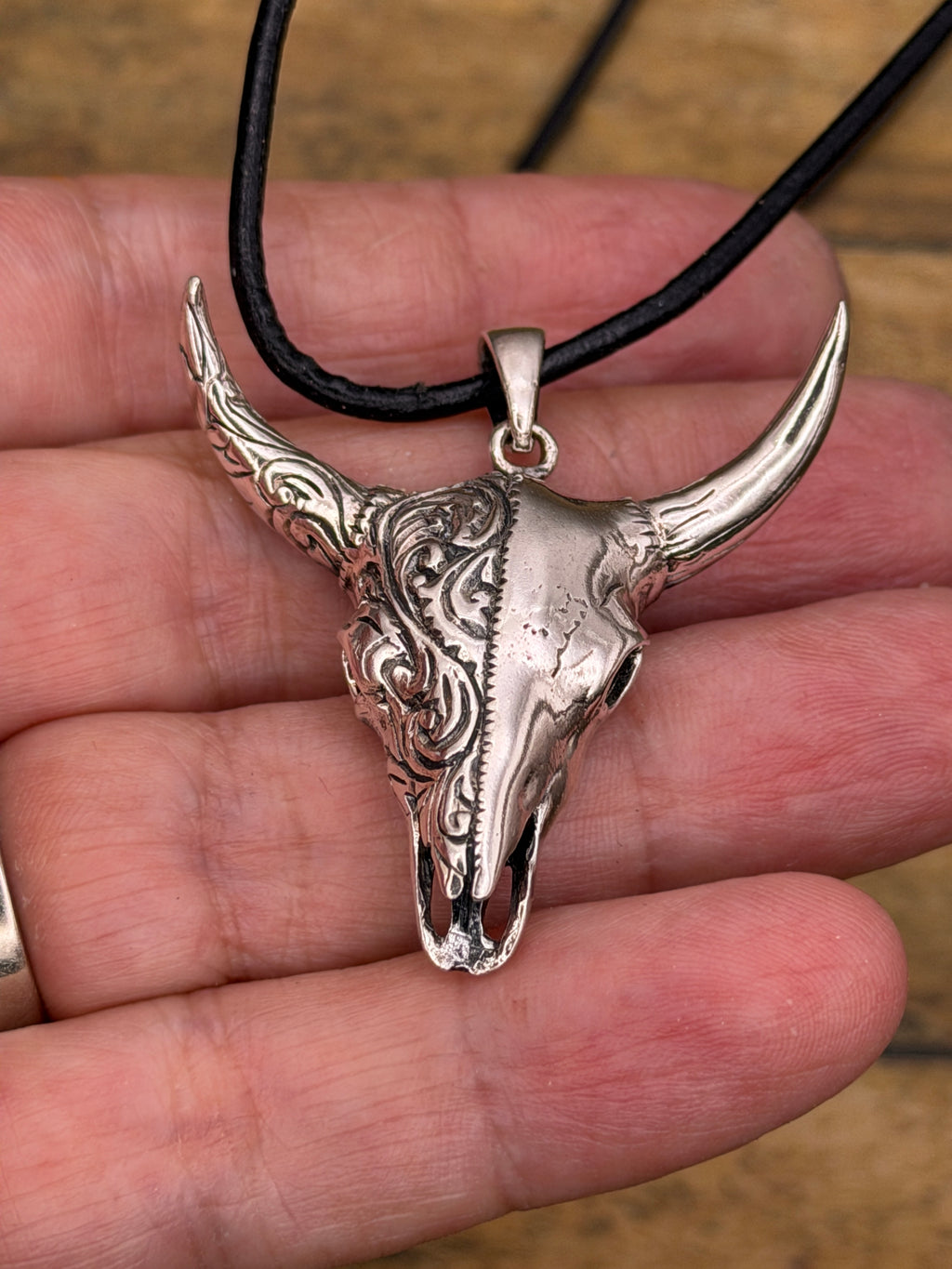 Brandy-Sterling Silver Engraved Cow Skull Pendant on Leather Rope