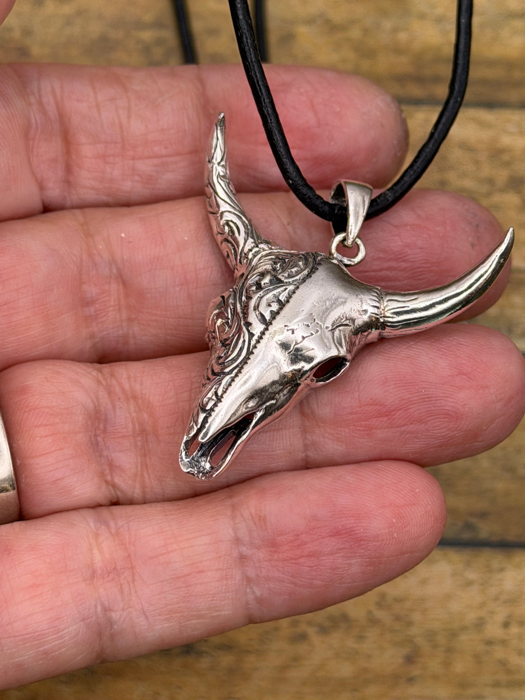 Brandy-Sterling Silver Engraved Cow Skull Pendant on Leather Rope
