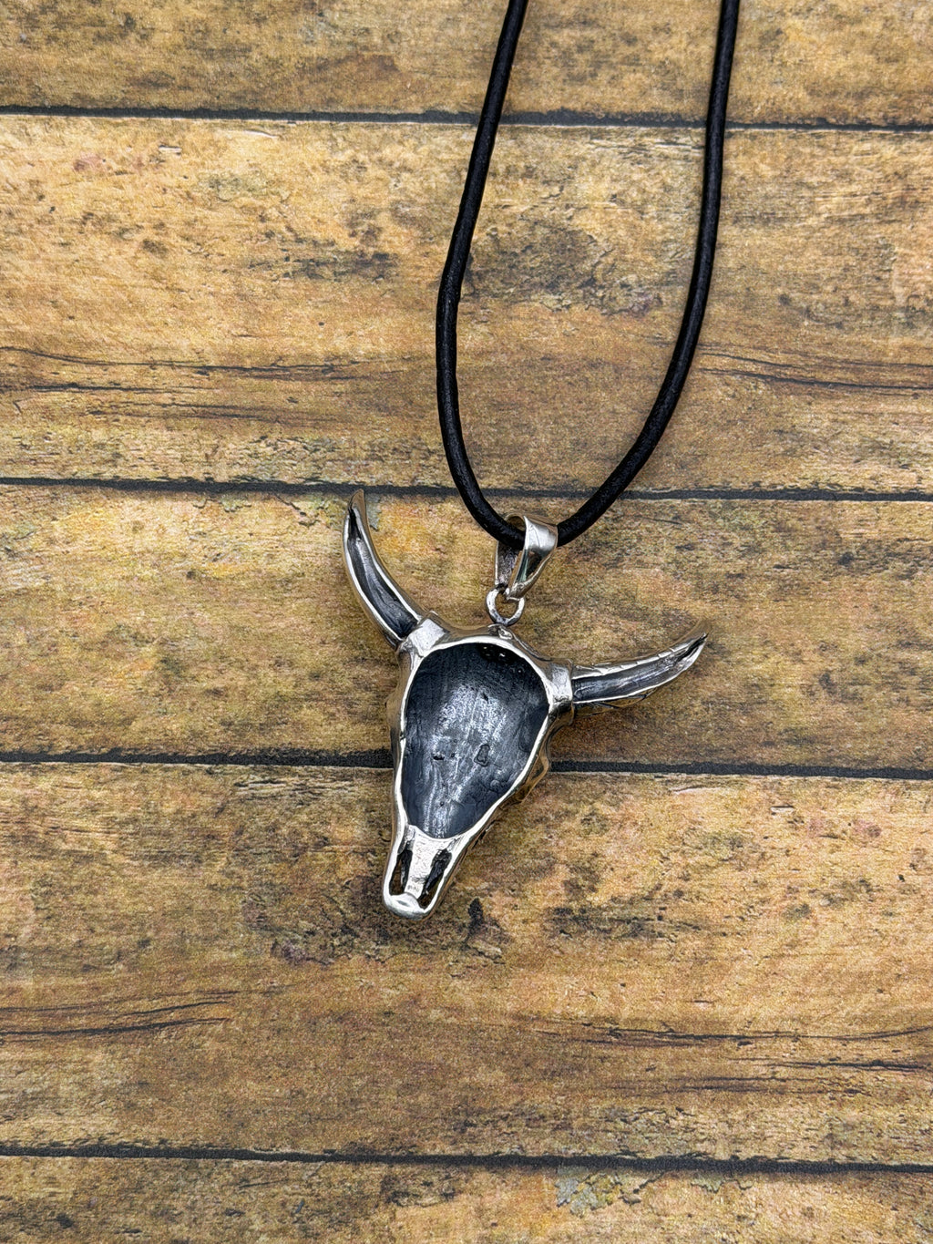 Brandy-Sterling Silver Engraved Cow Skull Pendant on Leather Rope