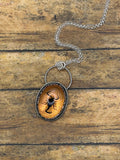 Willa-Spiderweb Detail Black Scorpion in Orange Shimmer Resin Pendant