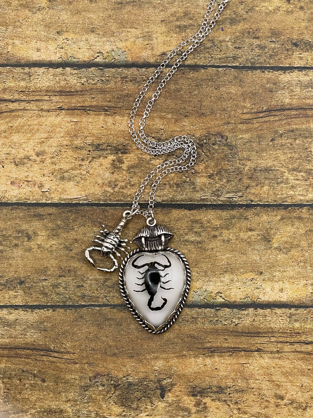 Wilma-Black Scorpion in White Resin Heart Charm Necklace with Scorpion and Fangs Charm
