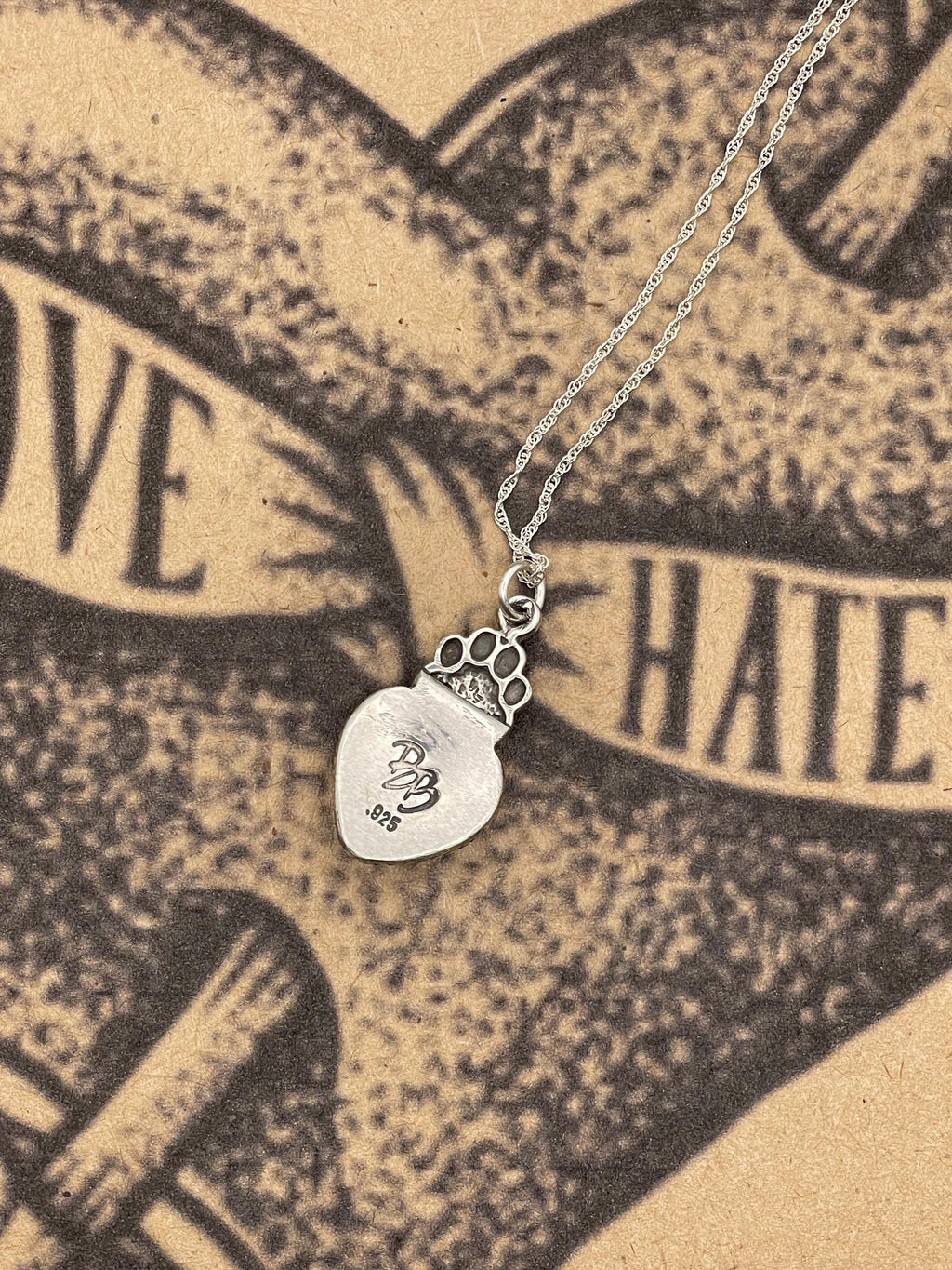 Rubi-Tiny Red Rosarita Heart Pendant with Dog Paw Detail