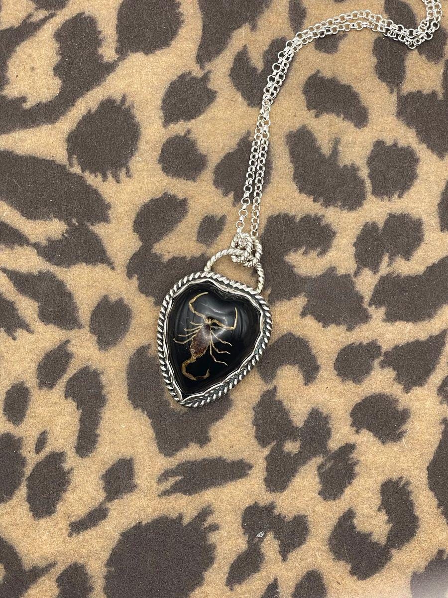 Warner-Golden Scorpion in Black Resin Heart Necklace