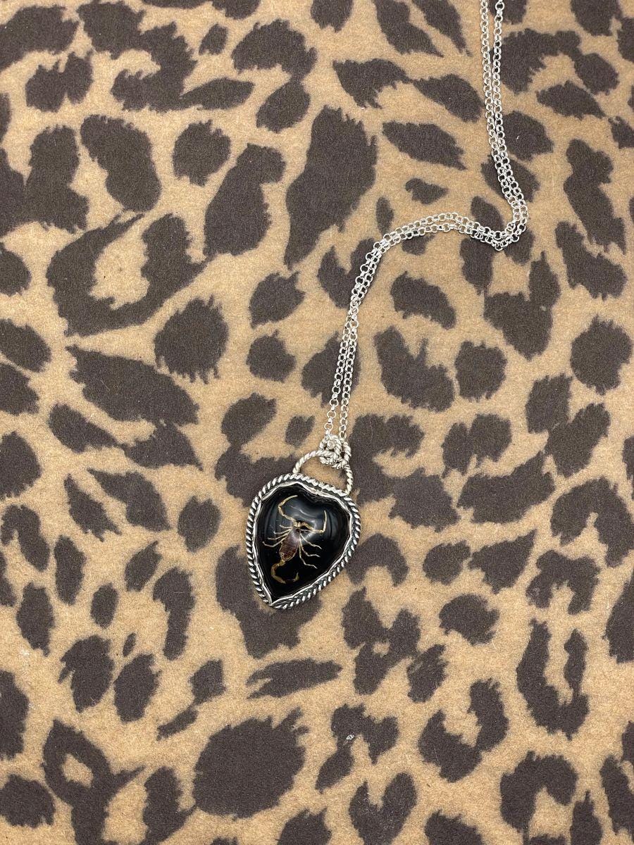 Warner-Golden Scorpion in Black Resin Heart Necklace