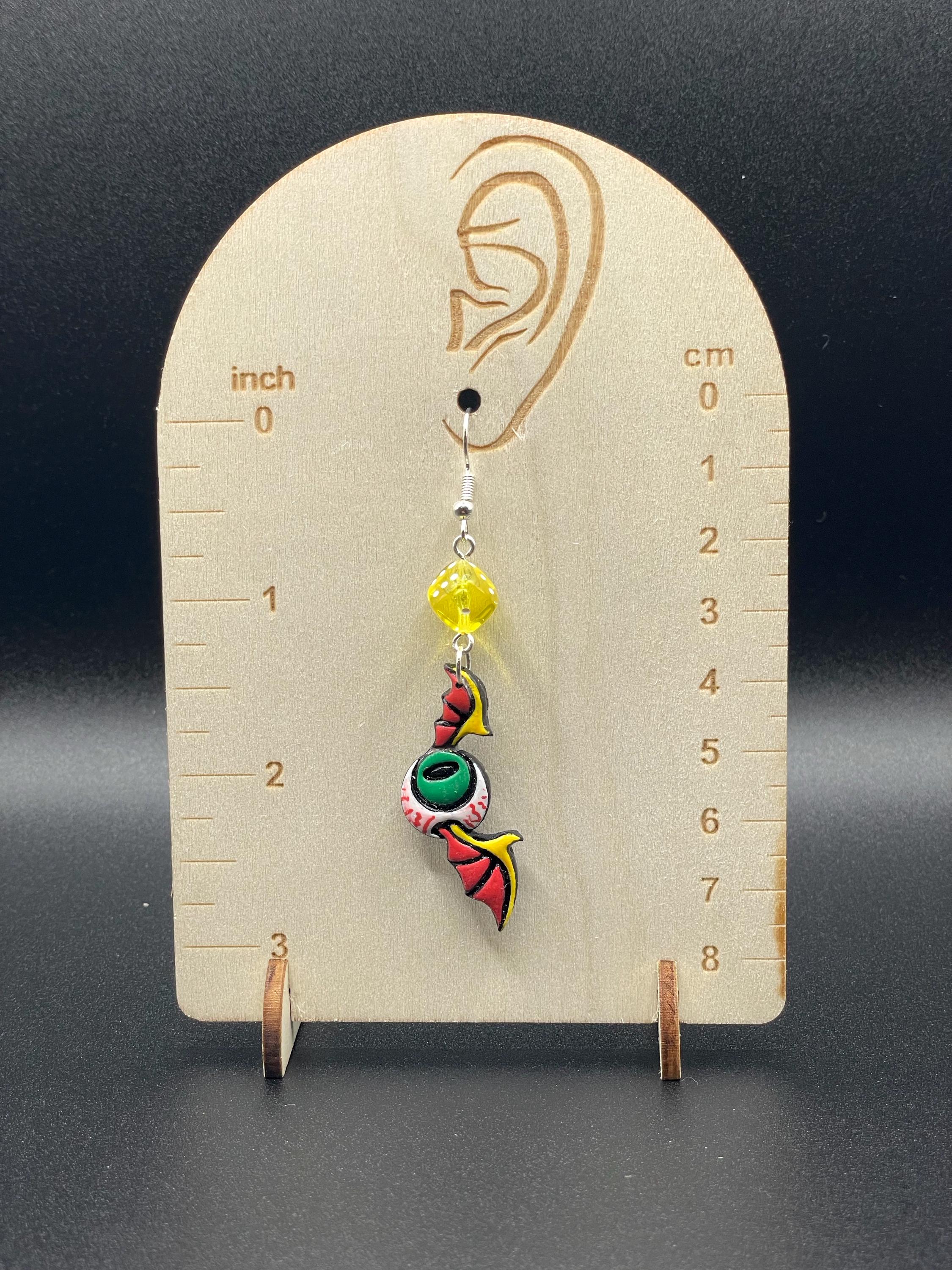 Tattoo-Eyeball Wing Earrings with Dice Detail: Handmade, Hand-Painted Polymer Clay